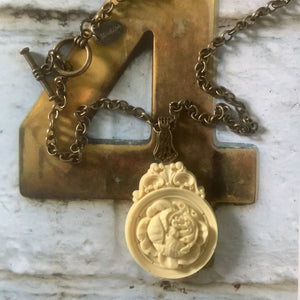 Flower medallion necklace