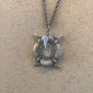 Medallion angel wing necklace